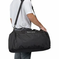 TaylorMade Performance Golf Medium Duffle Bag -Golf Clubs Shop taylormade 2020 performance medium golf duffle bag person holding